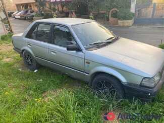 $1,500 Mazda 323 - $1,500 2