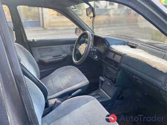 $1,500 Mazda 323 - $1,500 6