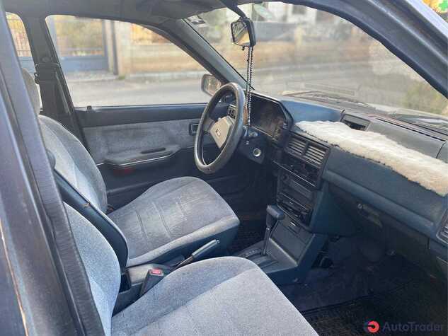 $1,500 Mazda 323 - $1,500 6