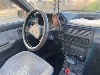 $1,500 Mazda 323 - $1,500 7