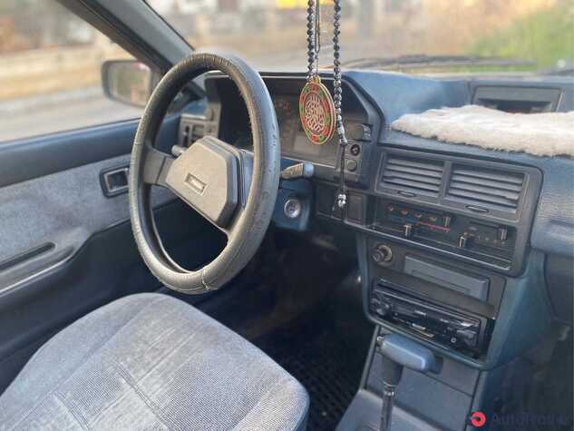 $1,500 Mazda 323 - $1,500 7