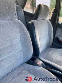 $1,500 Mazda 323 - $1,500 5