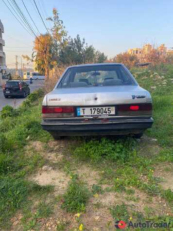 $1,500 Mazda 323 - $1,500 8