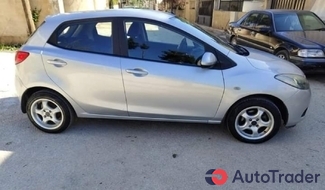 $6,000 Mazda 2 - $6,000 3