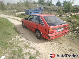 $1,000 Nissan Bluebird - $1,000 9