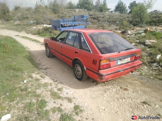 $1,000 Nissan Bluebird - $1,000 9