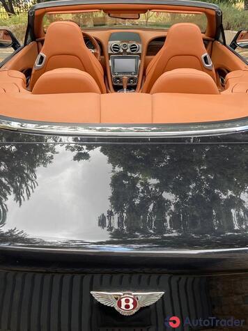 $100,000 Bentley Continental GT - $100,000 9