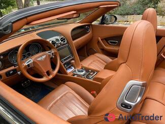$100,000 Bentley Continental GT - $100,000 6