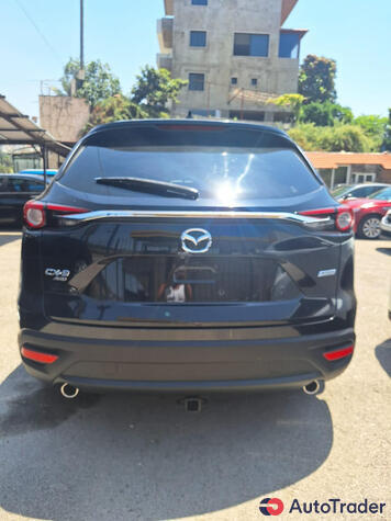 $25,000 Mazda CX-9 - $25,000 4